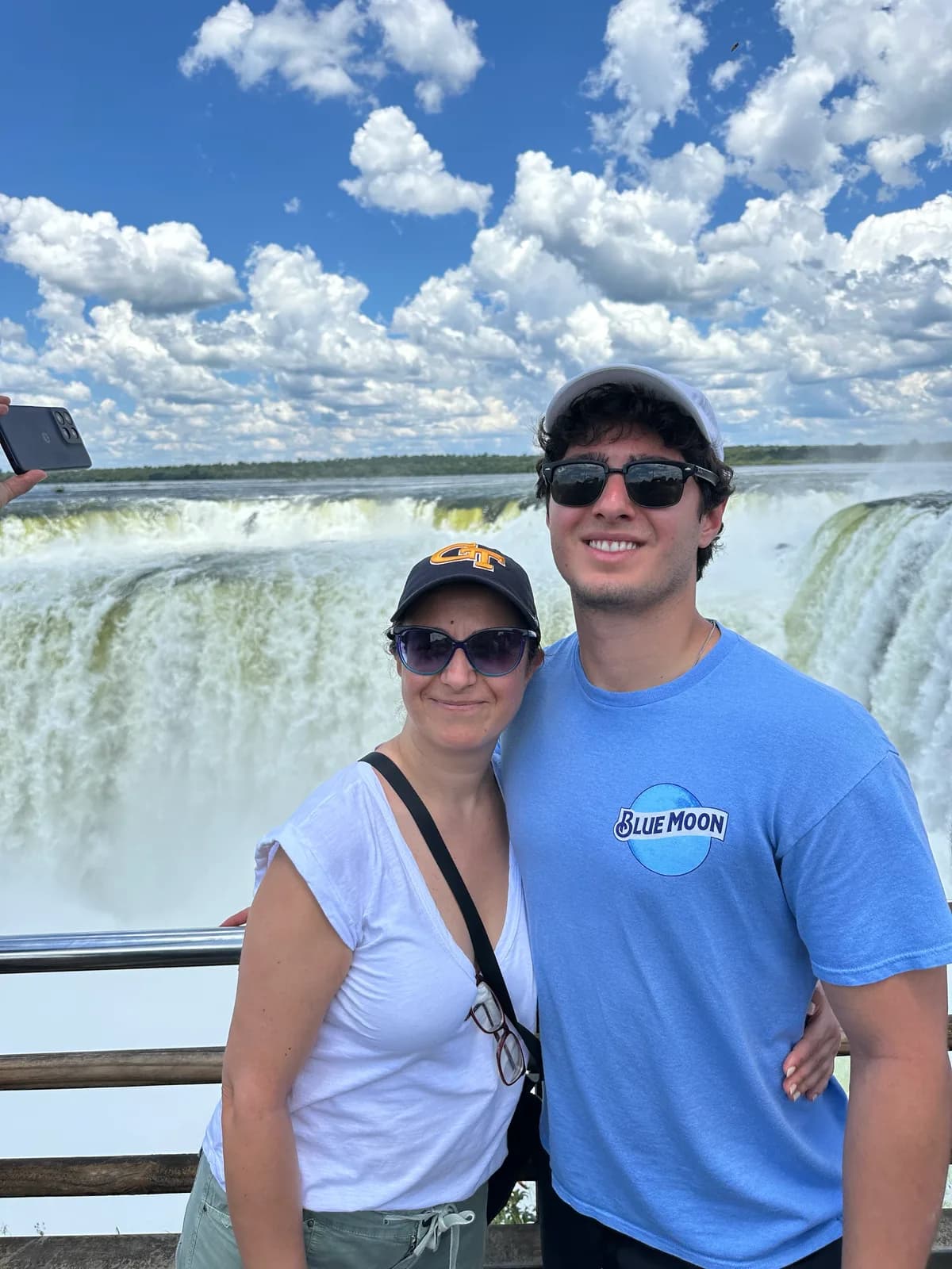 Efe Dincaslan in front of Iguazú Falls in South America