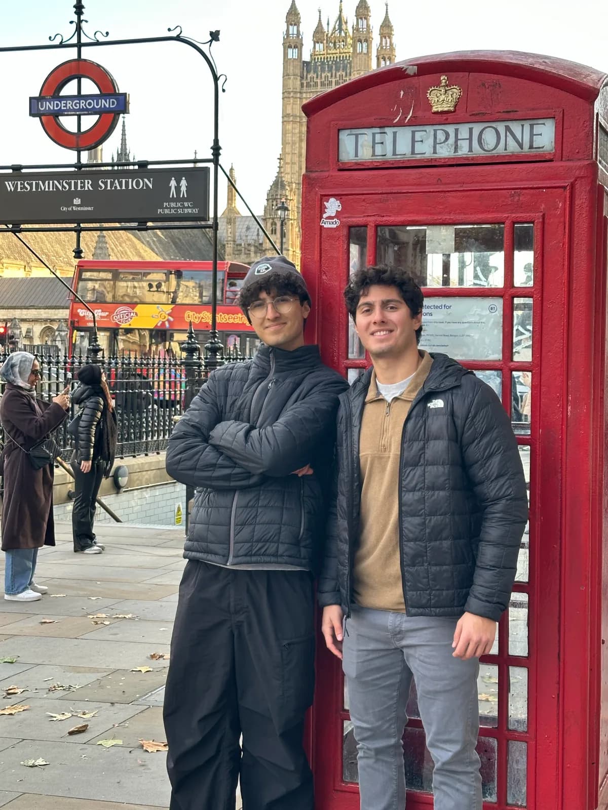 Efe Dincaslan by a red telephone box near Westminster in London, England