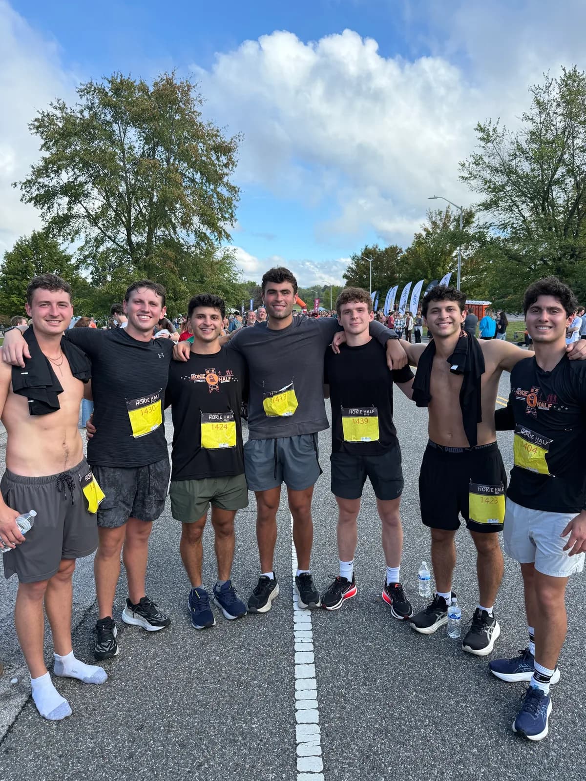 Efe Dincaslan with friends at the finish of the Hokie Half Marathon